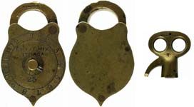 “E.M. & J.E. MIX ITHACA”. 2.674″ high x 1.638″ wide x .572″ deep. Brass body. Br