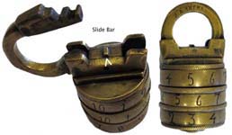 “H. A. ******”. 2″ high x 1″ diameter. Brass body. Brass shackle. Brass wheels.