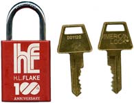 “H. L. FLAKE 100th ANNIVERSARY”. 3.028″ high x 1.492″ wide x .743″ deep. Steel b