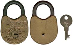 “G. W. Co. ANNIVERSARY 1829 1929”. 3 1/16″ high x 2″ wide. Brass body. Steel sha