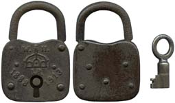 “W. II. IR. 1888 1913”. 2.900″ high x 2″ wide x .485″ deep. Iron body. Iron shac