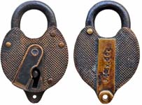 “U.S.EX.CO.”. 2 1/2″ wide. Brass body. Steel shackle.