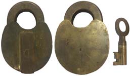 “W. E. CLARK NEW YORK”. 4 1/2″ high x 3″ wide x 1 1/4″ deep. Brass body. Brass s