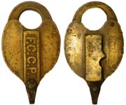 “F.C.C.P.” Brass body. Brass shackle.