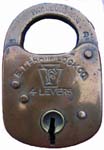 “E. T. FRAIM LOCK CO. 4 LEVERS” – Stamped Brass Case – Flat Brass Shackle – Flat