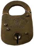 “E. T. FRAIM LOCK CO. 4 LEVERS” – Cast Brass Case – Flat Key. 3″ high x 2″ wide.