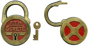 “F.T.H SURETE”. 4 1/16″ high x 2 13/16″ wide. Brass body. Brass shackle.