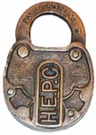 “H.E.P.C·”. 3″ high x 2″ wide. Brass body. Brass shackle. The reverse of the loc