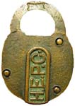 “H.E.P.C·”. 3″ high x 2″ wide. Brass body. Brass shackle.