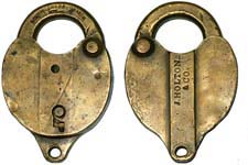 “J. HOLTON & CO.”. 3 1/2″ high x . Brass body. Brass shackle.