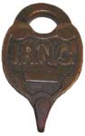 “I.R.N.C.”. Brass body. Brass shackle.