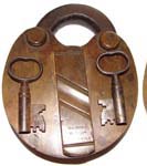 “H.C. JONES PATENT NEWARK N.J.”. 6 1/4″ high 4 3/4″ wide. Brass body. Steel shac