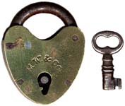 “M.W. & CO.”. 1 1/4″ high x 1″ wide x 1/4″ deep. Brass body. Steel shackle.