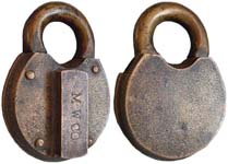 “M. W. CO”. 3″ high x 2 1/4″ wide x 7/8″ deep. Brass body. Brass shackle.