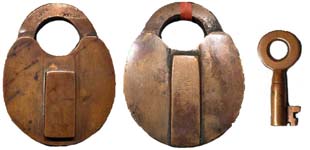 “G. W. NOCK”. 3″ high. Brass body. Brass shackle.Patent # 1243.