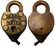 “O.M.E.CO. 3LEVER”. 3 13/16″ high including clevis x 2 3/8″ wide. Brass body. Br