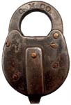 “Q. M. CO.” 3 3/8″ high. Steel body. Steel shackle.
