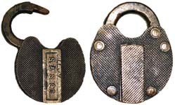 “S. & S. CO.”. 3″ high x 2 1/2″ wide. Brass body. Brass shackle.