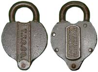 “T.F.C.CO.” – “TO GET KEY OUT CLOSE THE LOCK”. 4 1/8″ high x 2 5/8″ wide. Brass