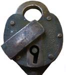 “T.T.P.L. CO OK OKLA”. 3 3/4″ high x 2 1/2″ wide. Brass body. Brass shackle.