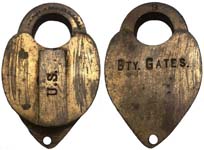 “U.S.” – “BTY. GATES.”. Brass body. Brass shackle. Lever.