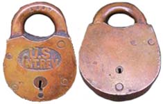 “U. S. INT. REV.”. Brass body. Brass shackle.