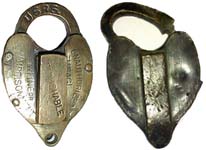 “U. S. R. S.”. Brass body. Brass shackle.