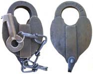 “W.A. ZELNICKER ST. LOUIS MO.”. Brass body. Brass shackle. We do not know if the