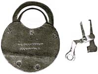 “G. L. CHAMBERLIN MARIETTA O.”. 3 1/4″ high x 2 3/4″ wide. Brass body. Brass sha