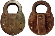 “P.O.D.”. 3 1/2″ high x 2 1/2″ wide. Stamped Steel body. Steel shackle. Used on