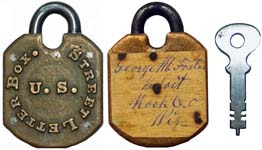 “U. S. STREET LETTER BOX”. 3″ high. Bronze body. Steel shackle. Warded.