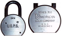 “U.S.P.S.”. Steel body. Steel shackle.