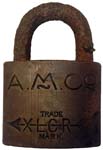 “A.M.CO” – “XLCR TRADE MARK”. 2″ wide. Brass body. Steel shackle. (R)