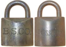 “B. S. CO.” – “RUSSWIN”. 1 15/16″ wide. Brass body. Brass shackle.