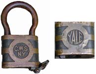 “C.W.S.N.Y.”. 4″ high. Brass body. Brass shackle.