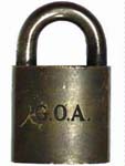 “G.O.A.”. Brass body. Steel shackle.