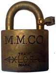 “M.M.CO” – “XLCR TRADE MARK”. 2″ wide. Brass body. Brass shackle. (R)
