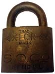 “S.O.CO” – “XLCR TRADE MARK” – “USE NO OIL”. 2″ wide. Brass body. Brass shackle.