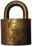 “S. O. CO.” – “XLCR TRADE MARK”. 2″ wide. Brass body. Brass shackle.(C)