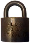 “S.O. CO.” – “OF CALIF.” – “XLCR”. 2″ wide. Brass body. Brass shackle. (R)