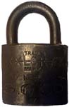 “S. O. CO.” – “NEBR.” – “XLCR TRADE MARK”. 2″ wide. Brass body. Steel shackle. (