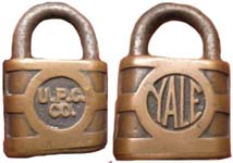 “U.P.C. CO.” – “YALE”. 2 1/4″ high. Brass body. Steel shackle.