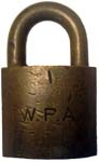 “W. P. A.”. 2″ wide. Brass body. Brass shackle.