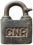 “C.N.R”. Steel body. Brass shackle. Keyway: Flat.