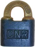 “C.N.R”. Steel body. Brass shackle. Keyway: Flat. “THE E.T. FRAIM LOCK CO.” is e