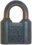 “M.C.G. & E. CO.” – “YALE”. 1 5/8″ wide. Steel body. Brass shackle. Keyway: Para