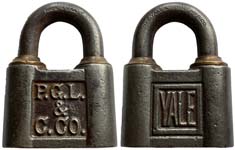 “P.G.L. & C. CO.” – “YALE”. 2 1/8″ high x 1 9/16″ wide. Steel body. Steel shackl