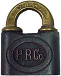“P.R.Co.”. Steel body. Brass shackle. Keyway: Flat. “CORBIN” is stamped on the o