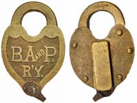 “B. A AND P. R’Y.”. Brass body. Brass shackle.