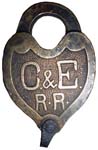“C.&E. R·R·”. Brass body. Brass shackle.